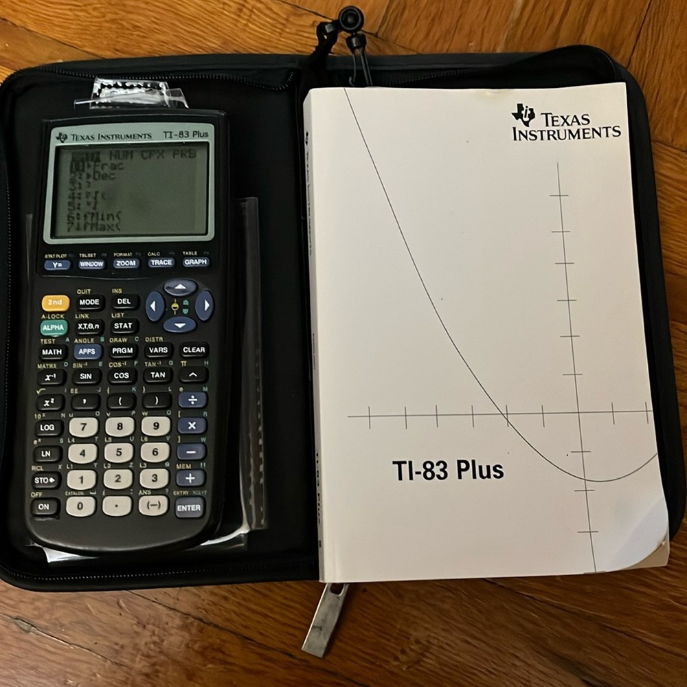 Texas Instruments USA TI-83 Plus. Graphing Calculator,Guidebook,  Case,batteries
